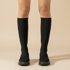 Women’s mid-calf pull-on boots with thick sole